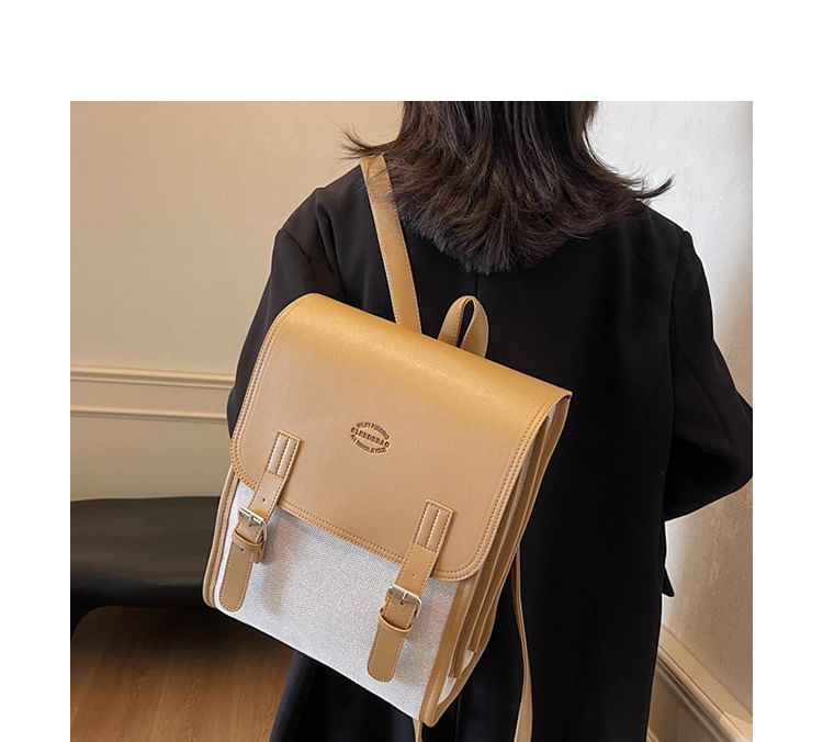 Two Backpack Flap Buckled Tone