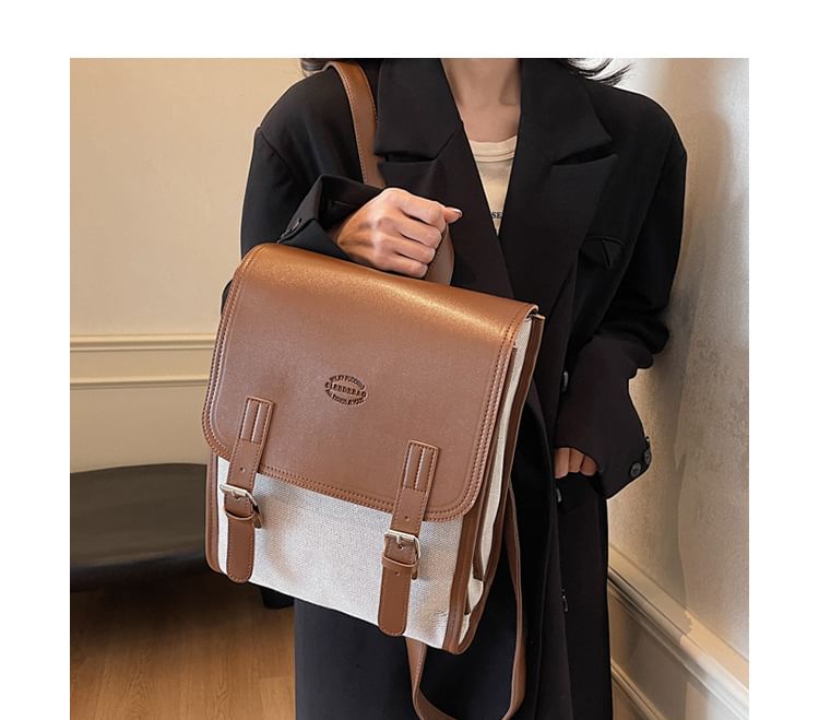 Two Backpack Flap Buckled Tone