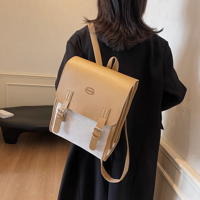Two Backpack Flap Buckled Tone