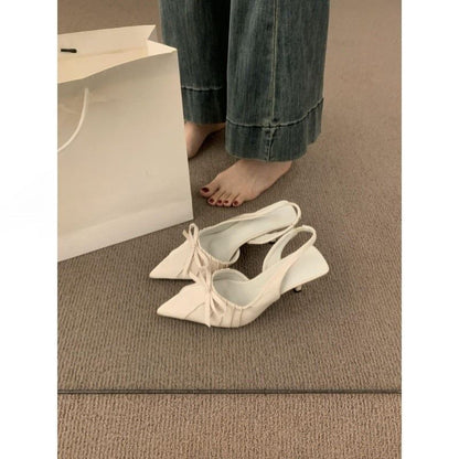 SamplePointed Toe Bow Slingback Pumps