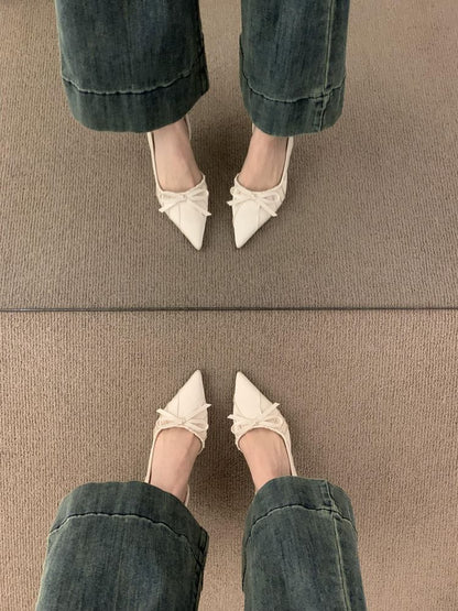 SamplePointed Toe Bow Slingback Pumps