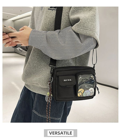 SampleSet: Lettering Multi-Pocket Crossbody Bag + Badge