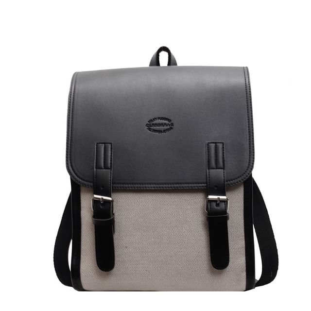 Two Backpack Flap Buckled Tone