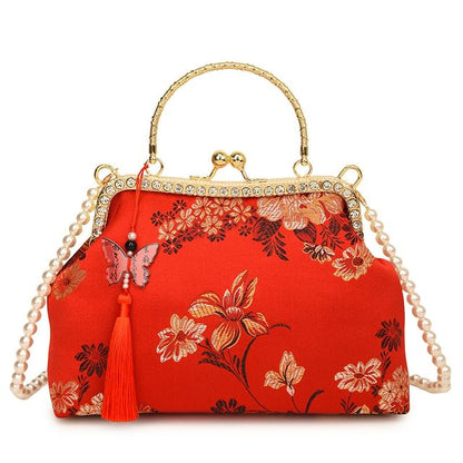 Wholesale SampleFaux Pearl Strap Kiss Lock Floral Embroidered Tassel Crossbody Bag