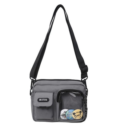 SampleSet: Lettering Multi-Pocket Crossbody Bag + Badge