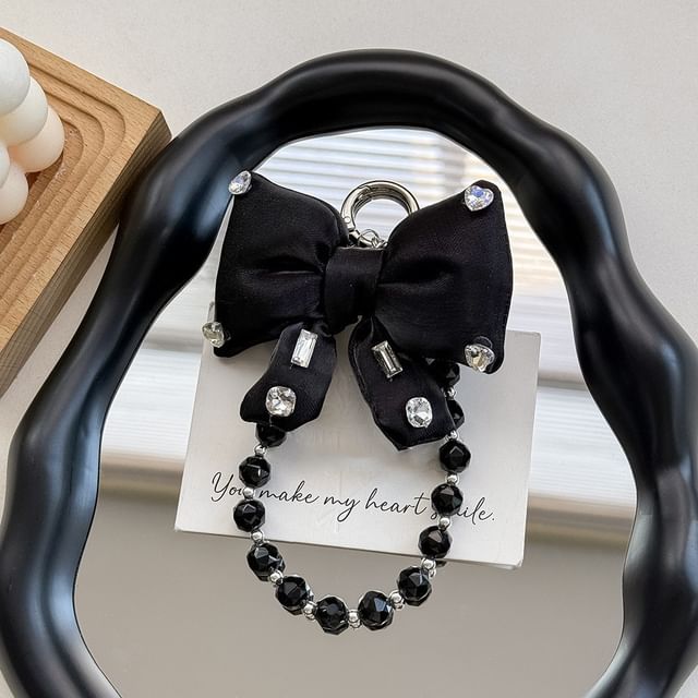 Rhinestone Pearl Pad Faux Bow Lanyard Phone with Charm