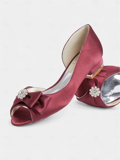 a in luxurious satin crafted Elegant with flats sparkling