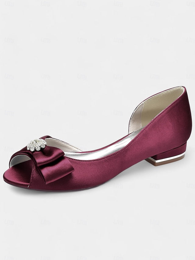 a in luxurious satin crafted Elegant with flats sparkling