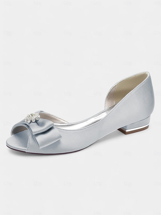 a in luxurious satin crafted Elegant with flats sparkling