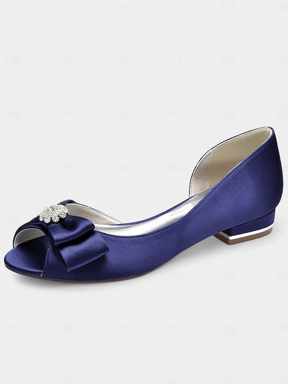 a in luxurious satin crafted Elegant with flats sparkling